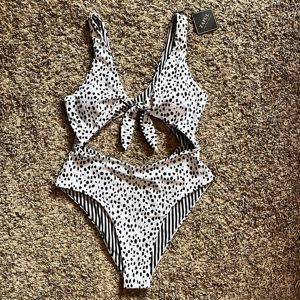 Black and white reversible one piece swim suit